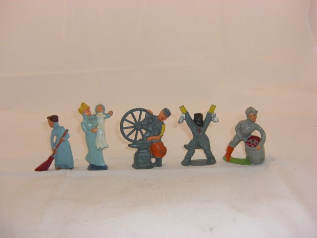 Manoil Civilians: M163 Woman Sweeping with Broom, M157 Lady with Child, M150 Blacksmith with Wheel, M140 Scarecrow with Top Hat and M164 Man Juggling Barrel. 5 Pieces. Condition Excellent.