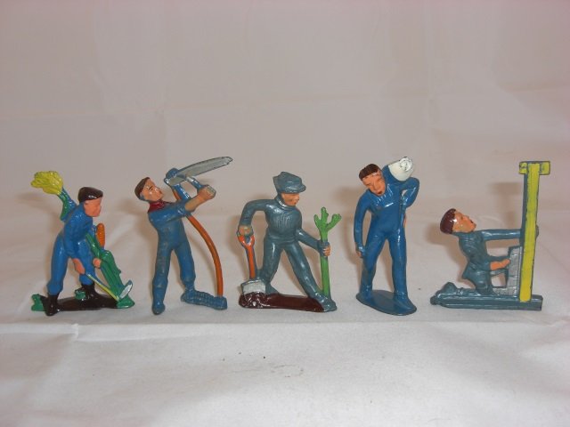 Manoil Civilians: M137 Farmer Cutting Corn, M134 Farmer Sharpening Scythe, M165 Man Planting Tree, M132 Man Carrying Sack on Back and M154 Carpenter with Square. 5 Pieces. Condition Excellent.