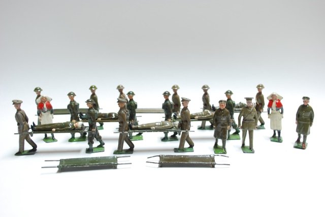 Britains from Various Sets 137 RAMC: In Khaki, Nurses, Female Ambulance Drivers, Stretcher Parties, Wounded and Stretchers. Pre-War and Post War. 33 pieces, unboxed, condition very good