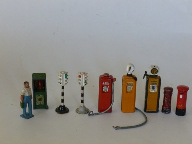 Britains Gas Pumps (petro) and Dinky: Includes Taylor and Barrett, and Crescent with 2 Mail Boxes, Traffic Signals, and a Mechanic with an Oil Can. Post War. 9 pieces, unboxed, condition very good