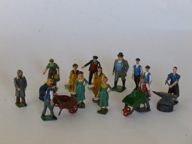 Britains Farm People: Post War. Including Seed Sower, Blacksmith and Anvil, Land Girl, etc. 17 pieces, unboxed, condition very good
