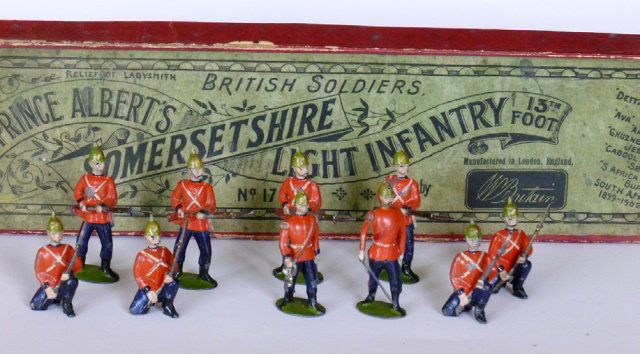 Britains Set #17 Somersetshire Light Infantry: Pre-War. First Version. Circa 1894. Oval Based. 10 pieces. With original box. Condition very good (paint chips on chests of two soldiers) Box good.