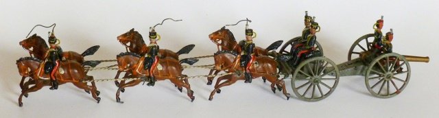 Britains Set #39 Royal Horse Artillery: Pre-War. First version. Collar Harness and four seated men, for gun and limber. 12 pieces. Condition very good. Unboxed.