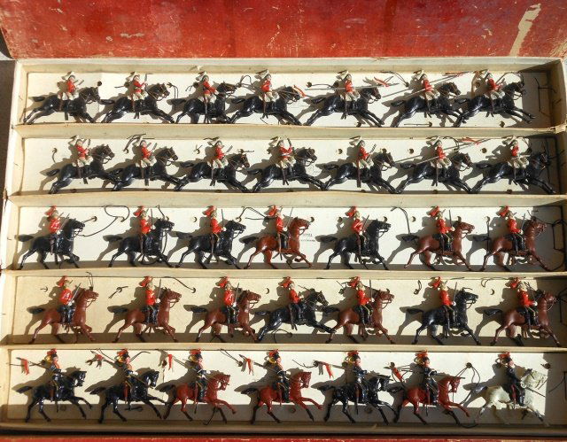 Britains Set #129 British Army Cavalry Display: Pre-War. 70 pieces, in original wooden box, untied. First Dragoon Guards, 12th Lancers, Royal Scots Greys, 11th Hussars, and the second Life Guards. Condition very good. Box good, lid has both ends an