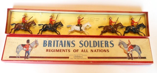 Britains Set #1349 Royal Canadian Police: Mounted. Post War. 5 pieces, with original R.O.A.N. Box, untied. Condition excellent. Box good; some pencil writing on lid.