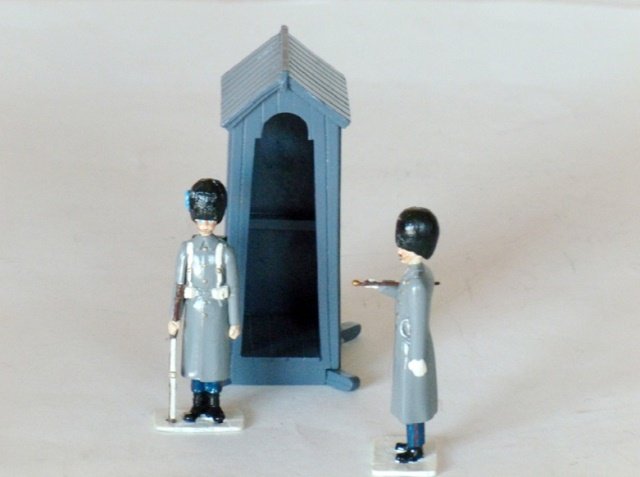 S and S Miniatures: 3 pieces. Irish Guards Officer, Man, and Sentry Box, winter dress with snow base. Unboxed. Condition Excellent.