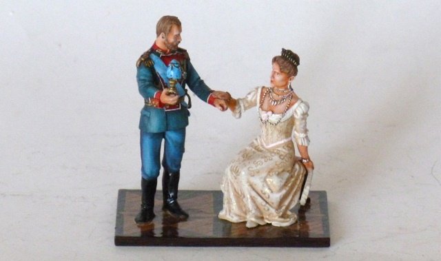Russian Manufacturer, Faberge Egg: Tsar Nicholas presenting a Faberge egg, to the Tsarina. One piece. Unboxed. Condition excellent.