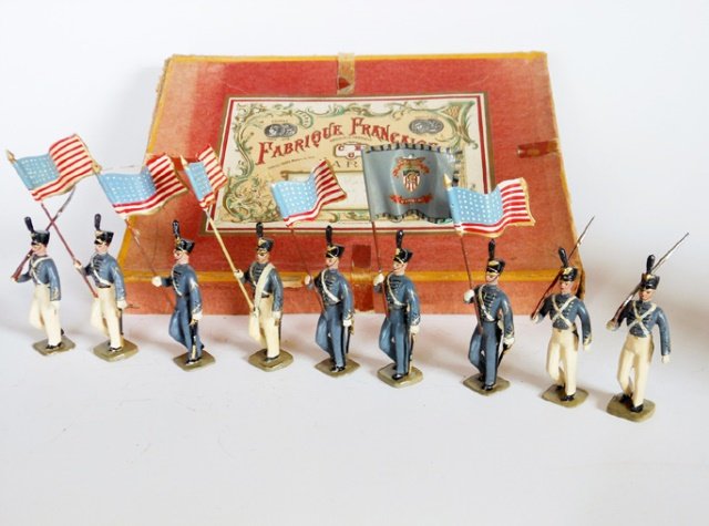 Mignot West Point Cadets Assortment: Summer and Winter uniforms, with flags. Post War. 9 pieces with original box. Untied. Condition excellent. Box good.