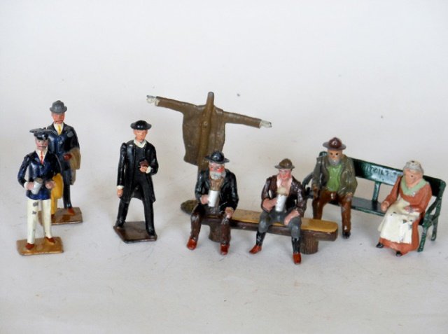 Britains Civilians Assorted: Including yachtsmen, a railway passenger with bowler hat, thin vicar, and other farm figures. Pre-War and Post War. 10 pieces. Unboxed. Condition very good.