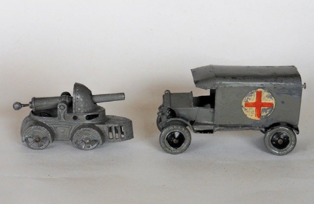 Taylor and Barrett Extremely RARE: Civilian Ambulance and an SR WWI Armored car. Pre-War. Two pieces. Ambulance missing back door. Condition good. Unboxed.