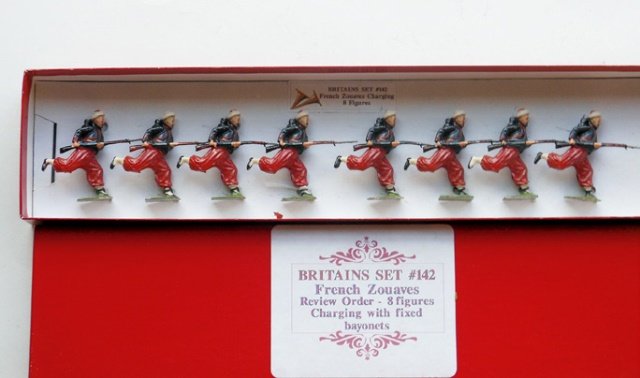 Britains Set #142 Zouaves: Post War. 8 pieces. Tied in a plain red box. Condition very good.