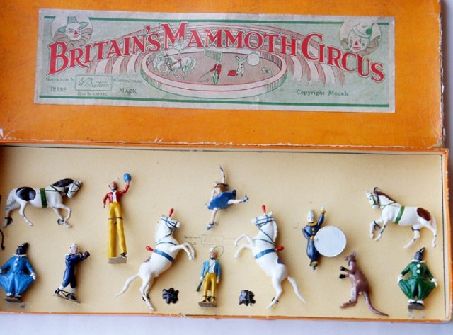 Britains Set #2054 Circus: Post War. 14 pieces. Tied in original illustrated box. Condition excellent. Box very good.
