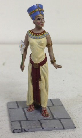 Courtenay- Egyptian Queen Nefertiti: On Cobblestone base with Cali Lilli. Signed on base 'Queen Nefertiti Made in England by R Courtenay.' 1 Piece. Post War. Beautiful detail, slight nose chip. Condition Excellent.
