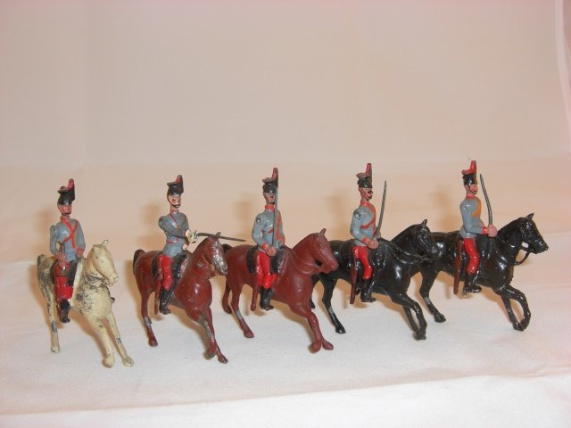 Britains from Set #175 Austrian Lancers: Britains from set #175 Austrian Lancers; all but officer on 1902 castings; mismatched; condition excellent; 5 pieces; pre war.