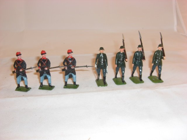 Britains from Sets #432 & #189: Britains from #432 & #189; 4 Germans & 3 Belgians; condition pristine; 7 pieces; post war.