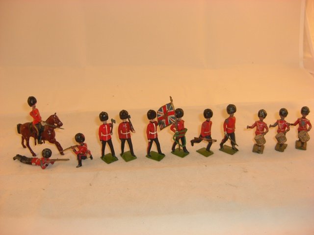 Britains Various Guards: Britains various Guards; 3 broken drumsticks; condition very good & excellent; 12 pieces; pre & post war;.