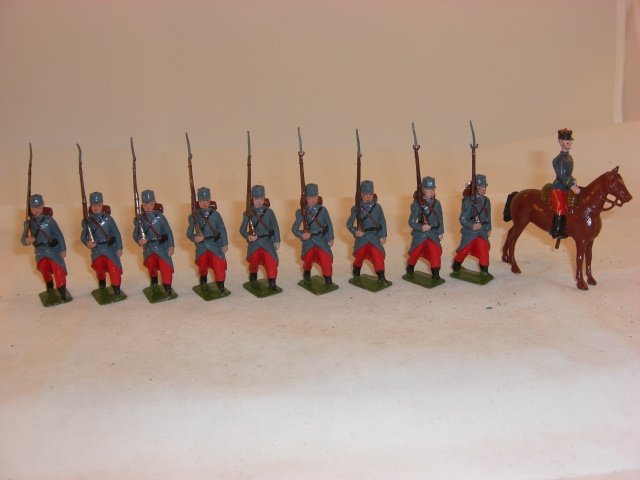 Britains from #141 French Infantry Review Order: Britains from #141 French Infantry Review Order; condition excellent; 10 pieces; post war.