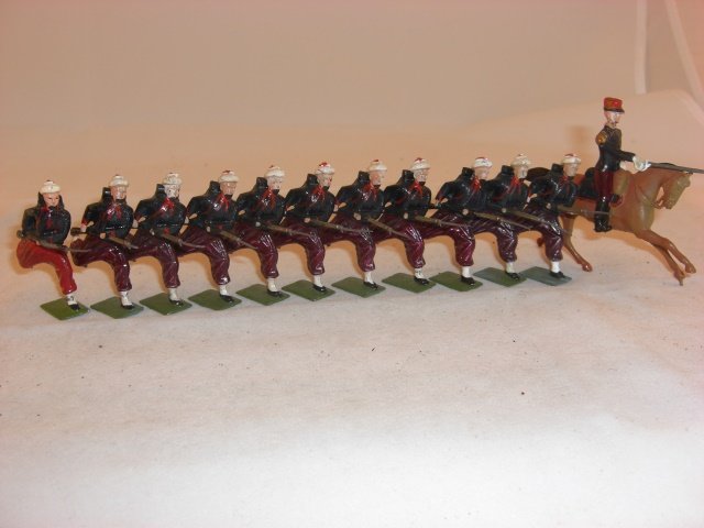 Britains from #142 & #9166 Zouaves: Britains from #142 Zouaves & others from #9166 Zouaves; 1 broken bayonet; condition excellent; 12 pieces; post war.
