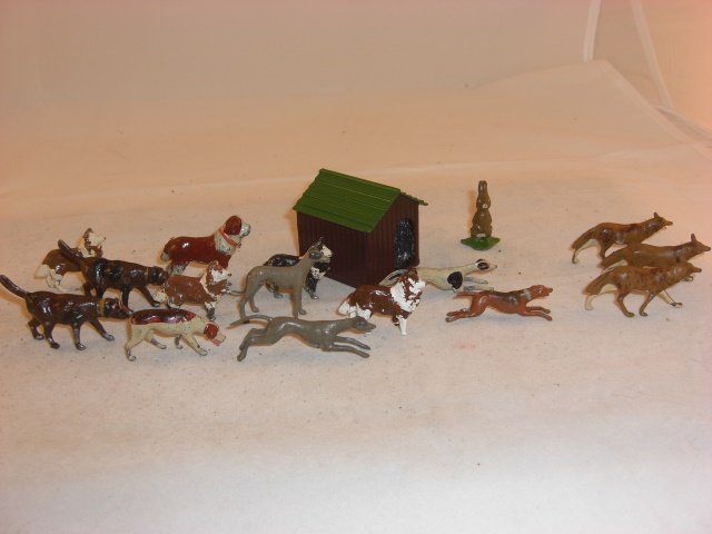 Britains Dogs, Doghouse & Foxes: Britains dogs, doghouse, foxes & other maker (2 dogs & rabbit); condition excellent; 16 pieces; post war.