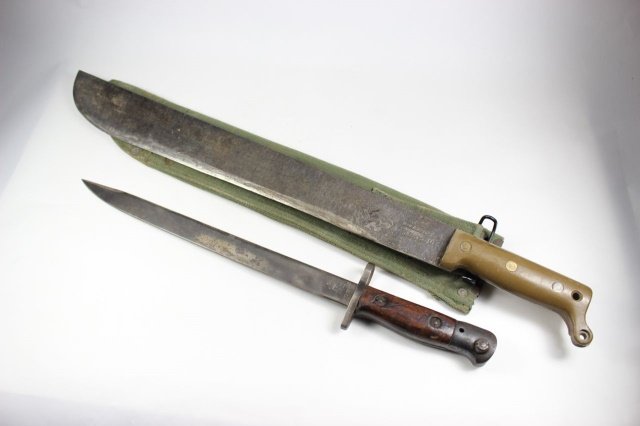 WWII US Machete: With sheath Dated 1945 and WWI British Bayonet 2 pieces.
