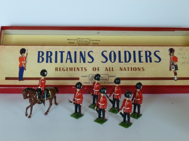 Britains Set #2083 The Welch Guards, ROAN: At ease with Mounted Officer. Post War. 7 pieces. Untied. Retaining card In original R.O.A.N. box. Condition excellent. Box very good, (writing on lid.)