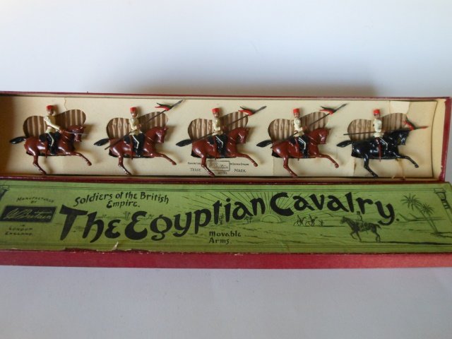 Britains Set #115 Egyptian Cavalry: 5 pieces, mounted. Pre-War. Slotted in retaining card, in original Whisstock box. Condition very good, (a little paint chipped off some of the horses legs) Box very good.