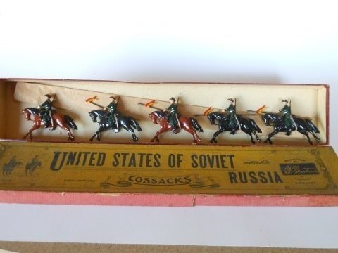 Britains Set #136 Russian Cavalry: 5 pieces, mounted. Pre-War. Untied. No retaining card. In original Whisstock box. Condition very good, (one missing tip of lance). Box very good, lid split on side.