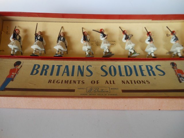 Britains Set #196 The Evzones, Royal Guards: Greek Army Royal Guards. Post War. 8 pieces. Untied. Retaining card inside original R.O.A.N. box. Condition excellent. Box very good.
