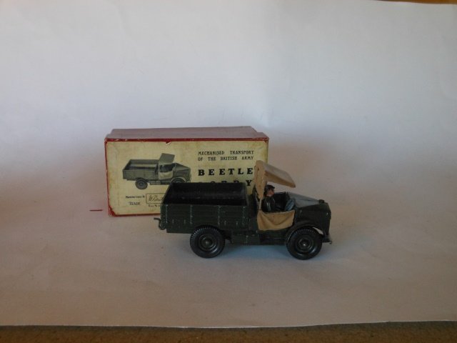 Britains Set #1877 Beetle Lorry: Light Troop Transport and General Service Truck. Two pieces truck with driver. Pre-War. Untied in original box. Condition excellent. Box very good.