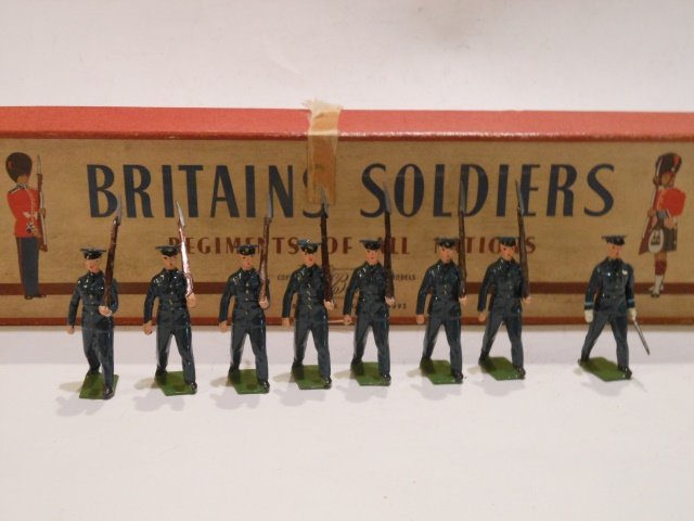 Britains Set #2073 Royal Air Force, ROAN: Marching at the slope. 8 pieces. Post War. Untied. Retaining card inside original R.O.A.N. box. Condition excellent. Box good, 2 corners split, some tape on lid.