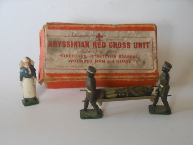 Johillco Abyssinian Medical Unit: Pre War. 5 pieces with original Box. RARE including, Nurse Stretcher Party and wounded. Condition Very good. Box Good, with splits in corner of lid.