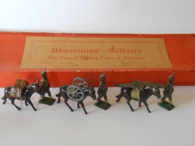 Johillco Abyssinian Mule Gun Team: Pre War. 7 pieces with Original Box RARE including Mules, Handlers and RARE Gun. Condition Excellent. Box Good.