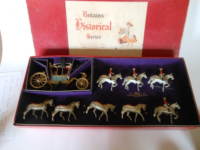 Britains Set #1470 State Coach: 9 pieces with original Historical label box. Untied. Post War. Condition very good. Box very good.