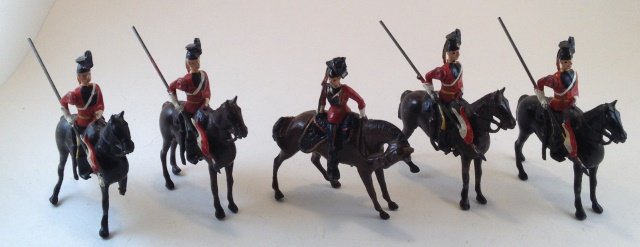 Britains 16th Lancers #33: 5 pieces. Condition Good to Very Good; broken leg and Officer has broken sword. Post War.