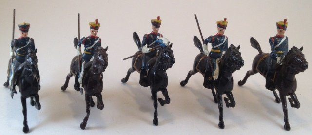 Britains Argentina Cavalry #217: 5 pieces. Condition Good to Very Good; 4 broken pieces.