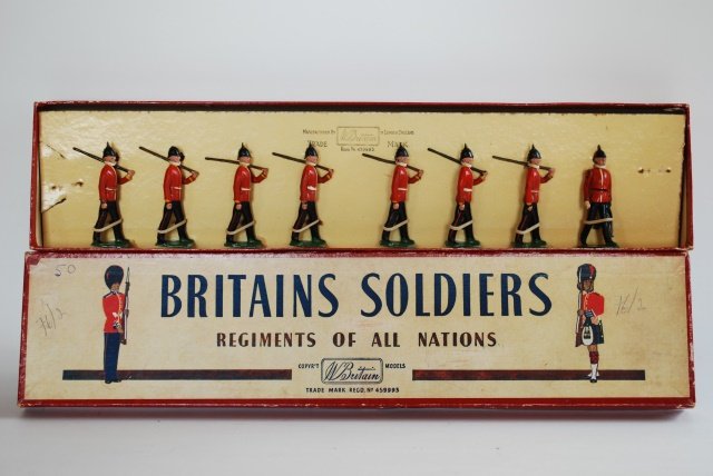 Britains Set #76 Middlesex Regiment: Post War. 8 pieces tied in original R.O.A.N. box. Condition good; one helmet ball missing. Box very good.