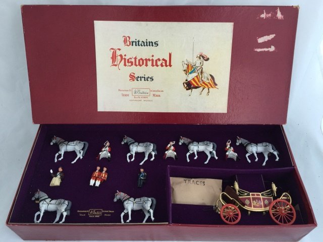 Britains Set #9402 State Open Road Landau: Post War. Originally tied in original box. 13 pieces. Condition figures near mint. Condition box excellent; with some minor tape marks.