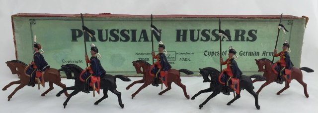 Britains Set #153 Prussian Hussars: Pre War. 5 pieces. Condition figures very good. Condition box good; replaced top label and tie card with wear.