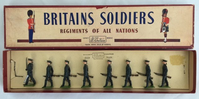 Britains Set #2091 Rifle Brigade: Post War. Originally tied in R. O. A. N. box. 8 pieces. Condition figures excellent. Condition box excellent.