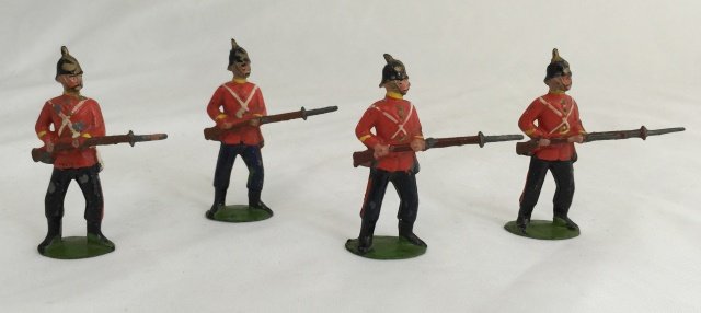 Britains from Set #16 East Kent Regiment: Pre War. Unboxed. First Version with round base. Circa 1910. 4 pieces. Condition figures very good.