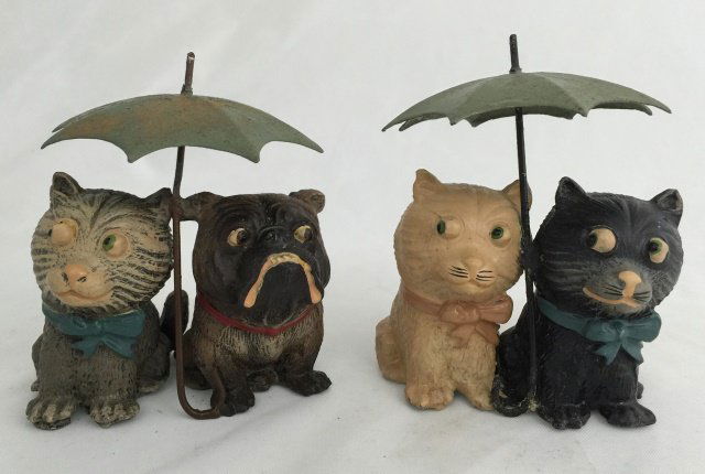 Heyde Souvenir Cat and Dog with Umbrella: Pre War. 100mm to top of umbrella. 2 pieces. Condition figures excellent.