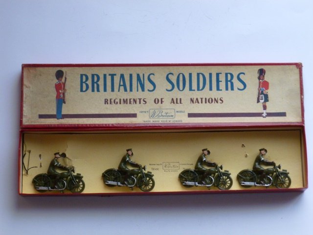 Britains Set #1791 Royal Corps of Signals: Dispatch Riders. Post War. 4 pieces tied in original R.O.A.N. box. Condition excellent. Box good (one corner of lid split and part of end label is missing)