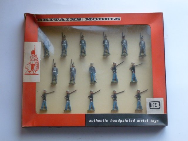 Britains Set #9381 U.S. Marines and West Point: Cadets Display. Post War. 16 pieces tied in original cellophane front box. Condition excellent. Box excellent.