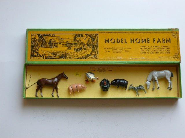Britains Farm Set #123F: Post War. 7 pieces tied in original box. Condition excellent. Box excellent.