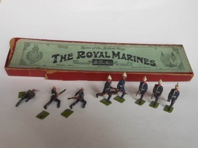 Britains Set #97 Royal Marines Running: 8 pieces with original Whisstock box. Pre-War. Untied. Paint condition excellent. (Officer and two men detached from base. Box good (split at 2 corners of lid and one end of lid missing)