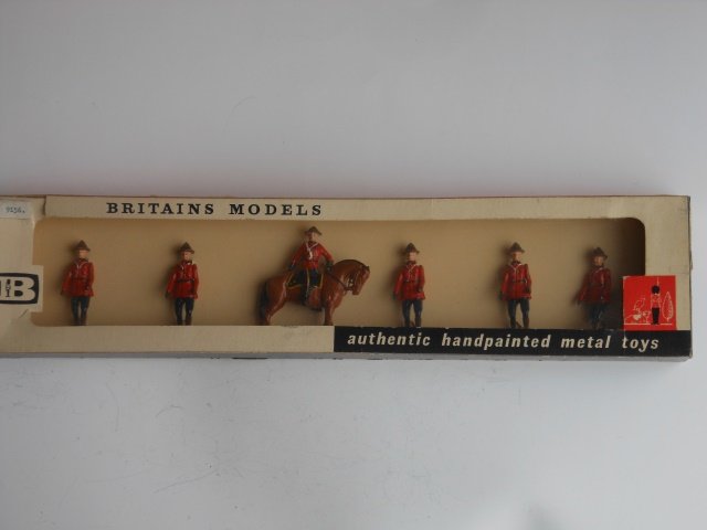 Britains Set #9156 Royal Canadian Mounted Police: 6 pieces. Post War. Tied in original cellophane fronted box. Condition excellent. Box excellent.