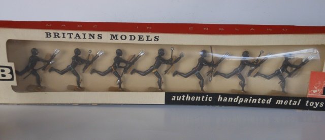 Britains Set #9190 Zulus: 7 pieces. Post War. Tied in original cellophane fronted box. Condition excellent. Box excellent.