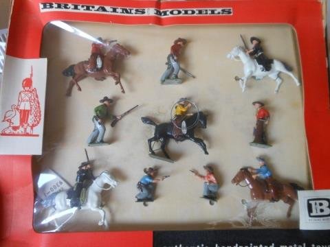 Britains Set #9388 Mounted & Foot Cowboys: 10 pieces. Post War. Tied in original cellophane fronted box. Condition excellent. Box excellent.