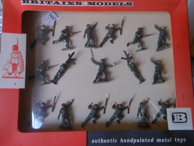 Britains Set #9346 British Infantry in Action: 17 pieces. Post War. Tied in original cellophane fronted box. Condition excellent. Box excellent.