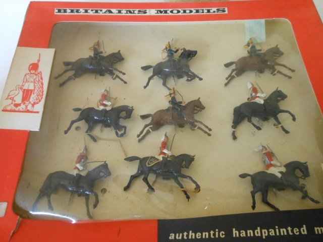 Britains Set #9305 Cavalry display: Life Guards and Hussars. 9 pieces. Post War. Tied in original cellophane fronted box. Condition excellent. Box excellent.